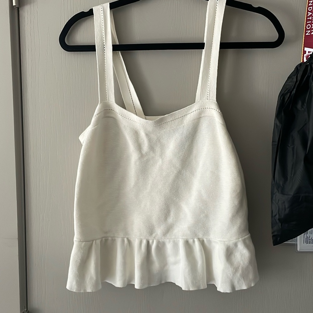 White peplum top